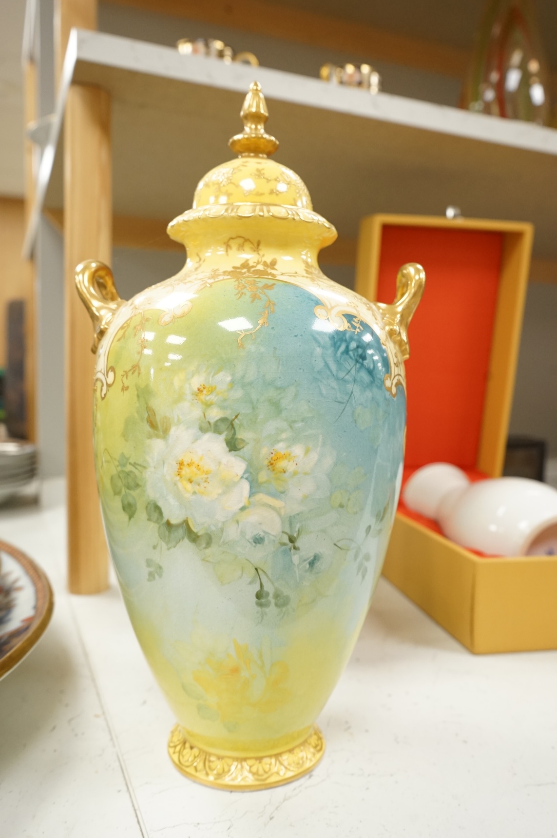 A pair of Bonn floral vases and covers, a modern Meissen vase, and an encrusted Sitzendorf vase, largest 35cm high